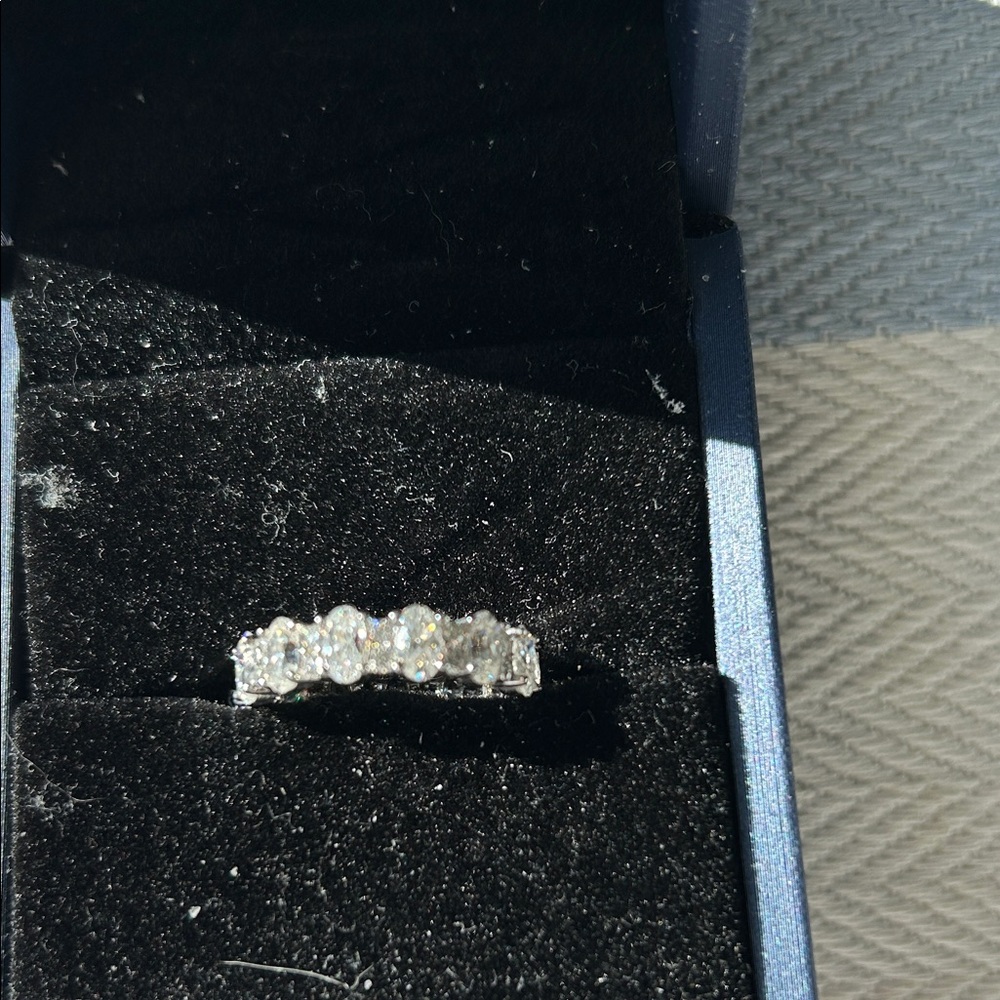 Beautiful Moissanite Eternity and 925 sterling silver ring, size 6